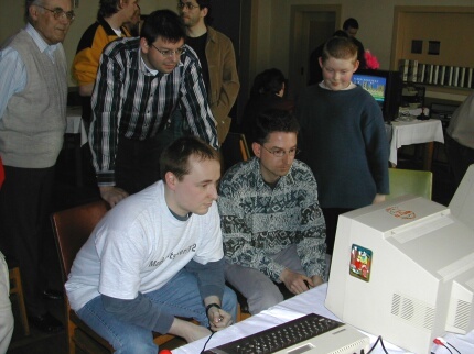 [Photo: Mad Butscher playing a game]