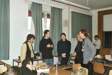 [Photo: Group standing]