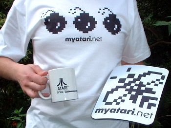 [Photo: MyAtari t-shirt, mouse-mat and mug]