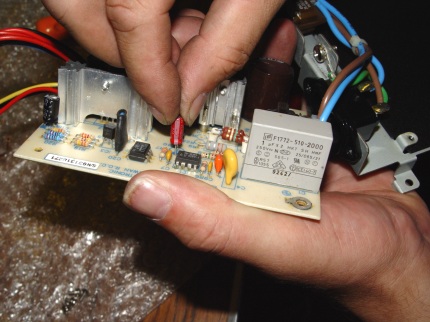 [Screen-shot: Fitting new capacitor]