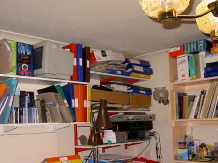 [Photo: Atari bits on shelf]