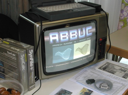 [Photo: The ABBUC stand showing the latest disk magazine intro.]