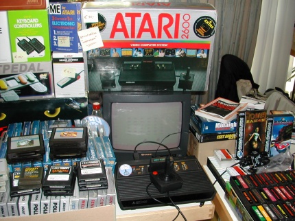 [Photo: Atari consoles, games and accessories everywhere you look]