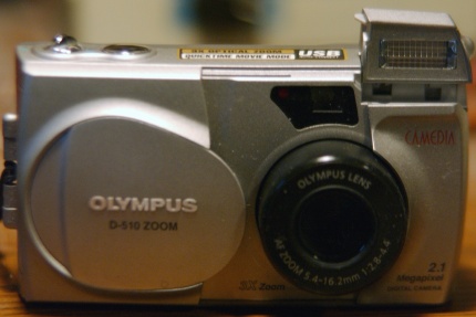 [Photo: Olympus open front]