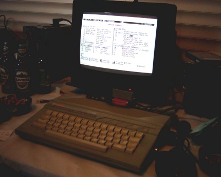 [Photo: Full view of XE computer logged into remote server]