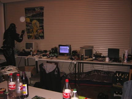 [Photo: TXG sleeping under the table]