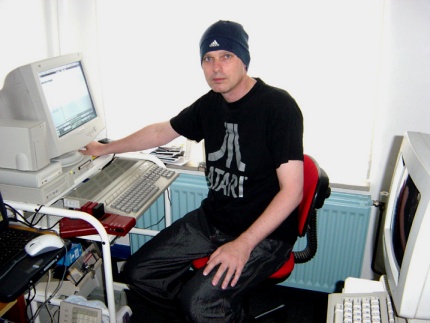 [Photo: Jos sitting at his Falcon]