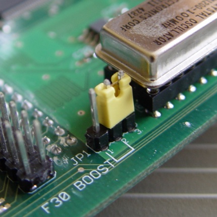 [Photo: 100 MHz oscillator]