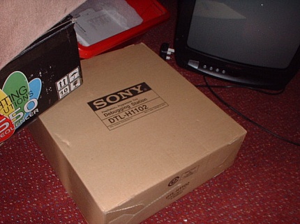 [Photo: Debug PlayStation box]