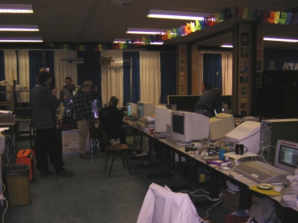 [Photo: Room full of Atari equipment]
