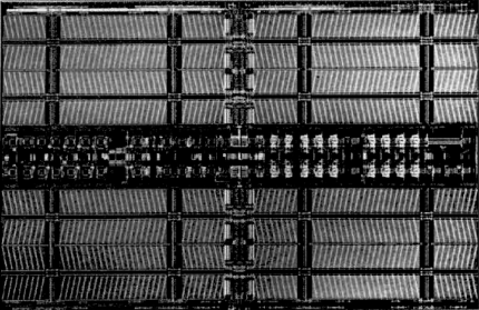 [Photo: 4 Mbit memory chip]