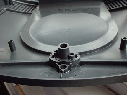 [Photo: Power switch and light lens removed]