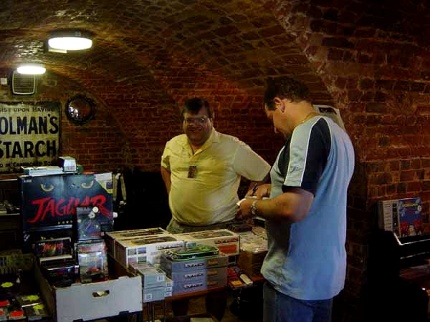 [Photo: Nick Harlow selling lots of stuff]