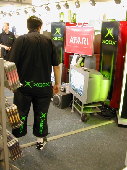 [Photo: Man in Xbox clothing]