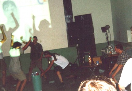 [Photo: Party people dancing]