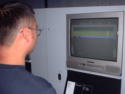 [Photo: Shiuming playing Breakout]