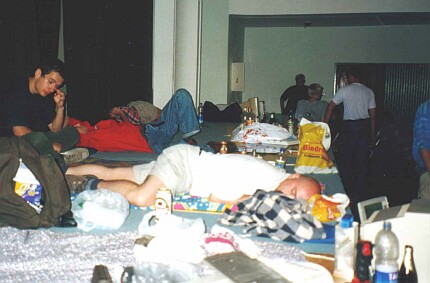 [Photo: Party people tired and sleeping]