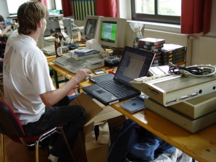 [Photo: TXG floating in a sea of hardware]