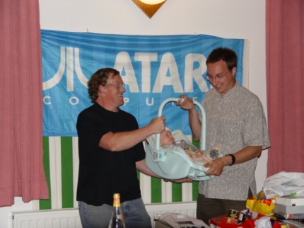 [Photo: Mr XY with his new baby]