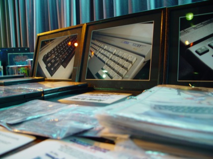 [Photo: Frame photographs of classic home computers]