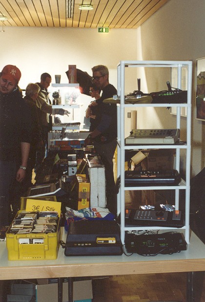 [Photo: stand of the organizers]